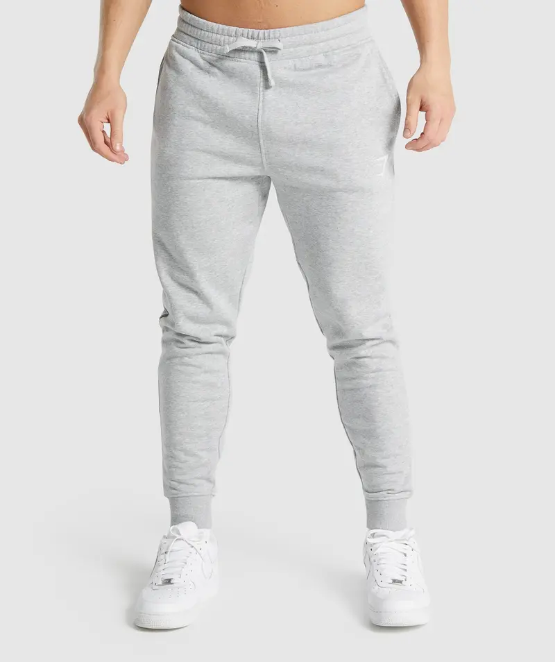 Gymshark Crest Relaxed Fit Joggers in Light Grey Marl