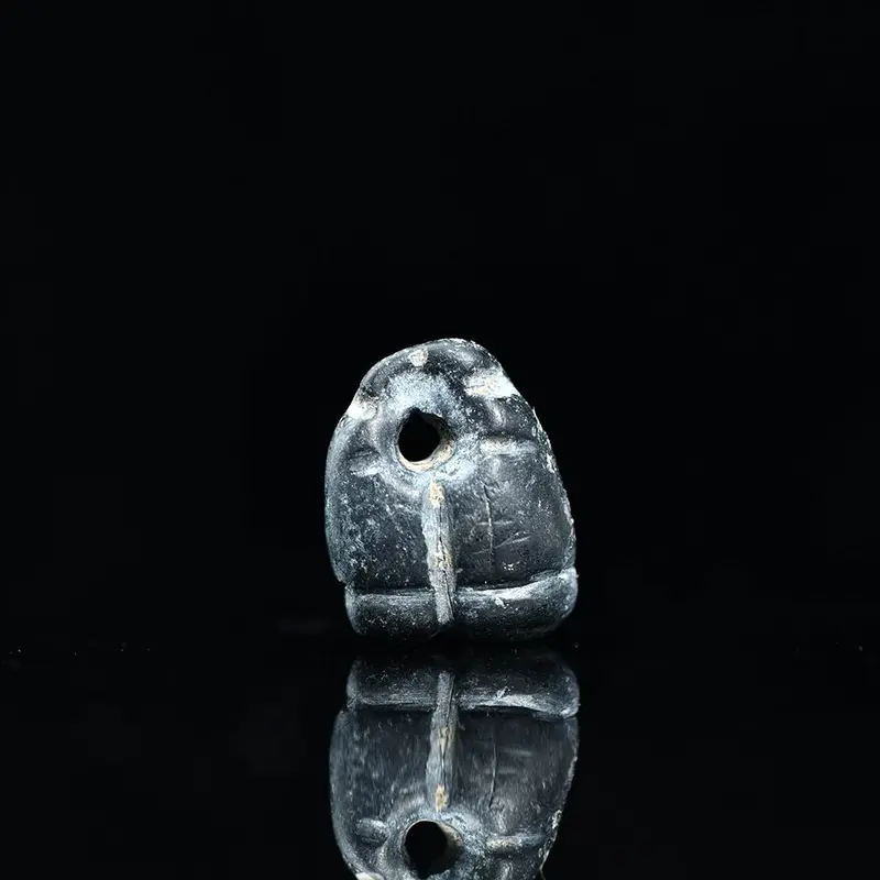 Late Chalcolithic Triangular Mesopotamian Pendant Seal, 4500–3200 BCE