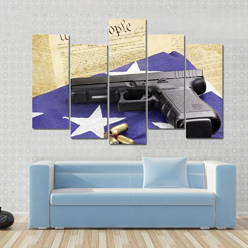 Pistol Resting on Folded National Flag Canvas Art
