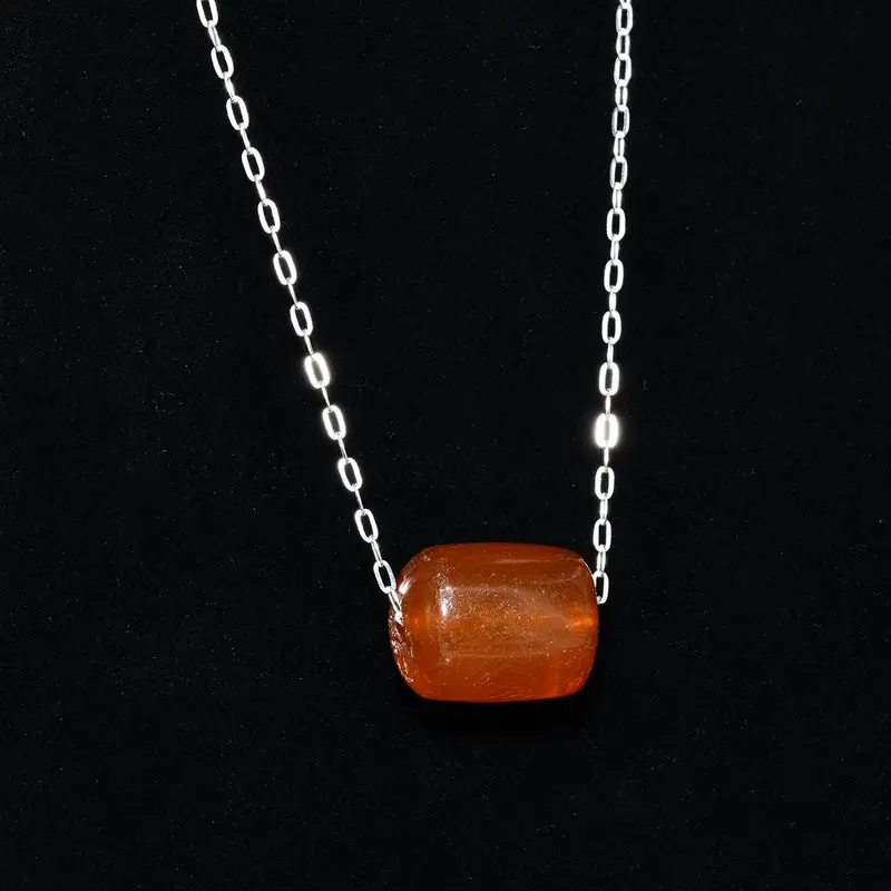 Single Roman Amber Bead Repurposed as a Pendant, 2nd Century CE